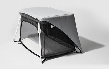 45 degree view of Lotus Crib Fun Shade in grey